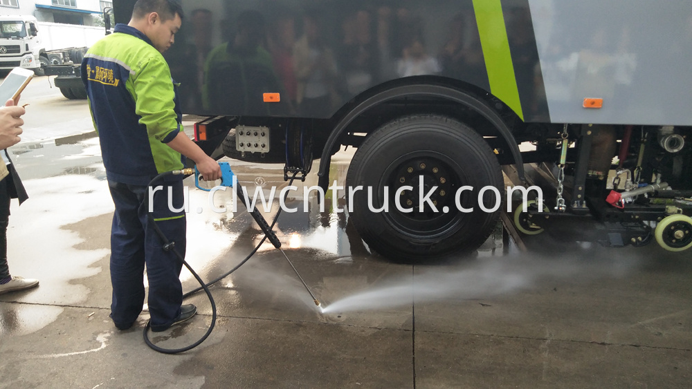 street sweeping truck high pressure washing